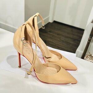 Bloody orange soles. Patent nude heels